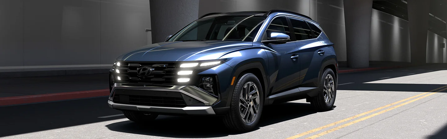 front view of a blue 2025 Hyundai Tucson Limited in Leesburg FL
