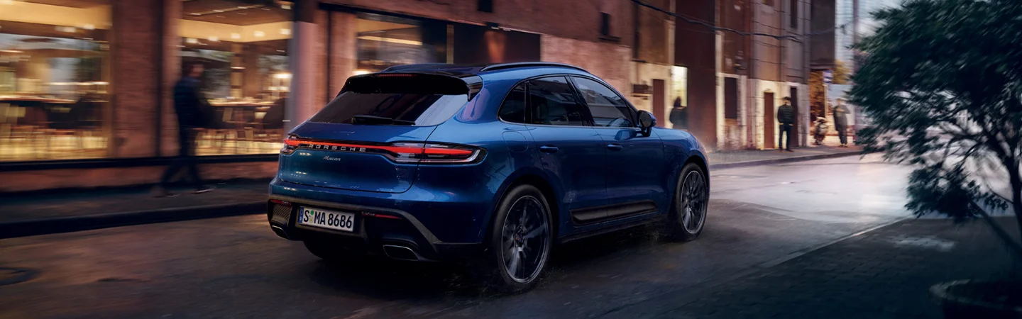 rear of blue Porsche Macan