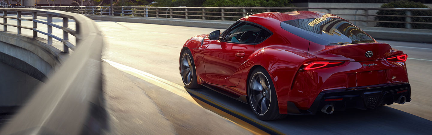 Rear view of the 2020 Toyota GR Supra in motion