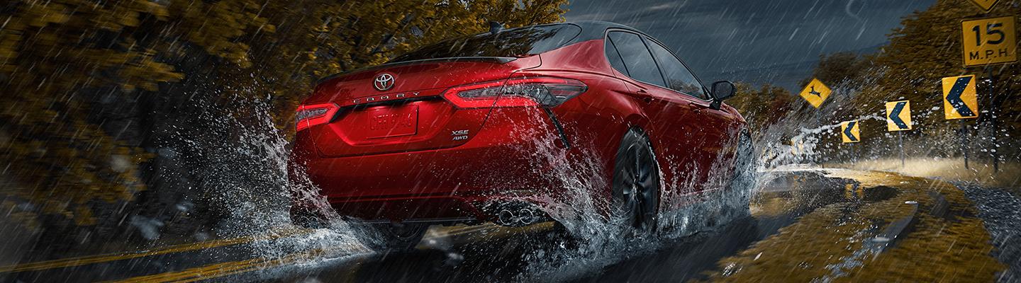 Toyota Camry driving in the rain
