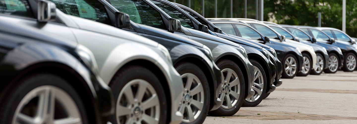 Passenger side profile view of parked cars.
