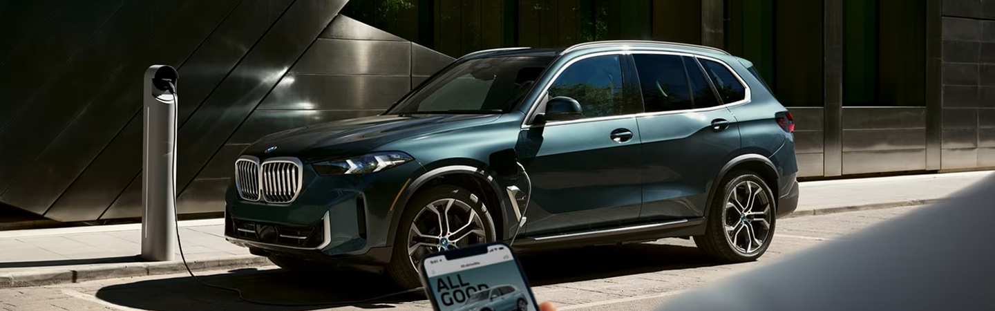2024 BMW X5 green sideview 