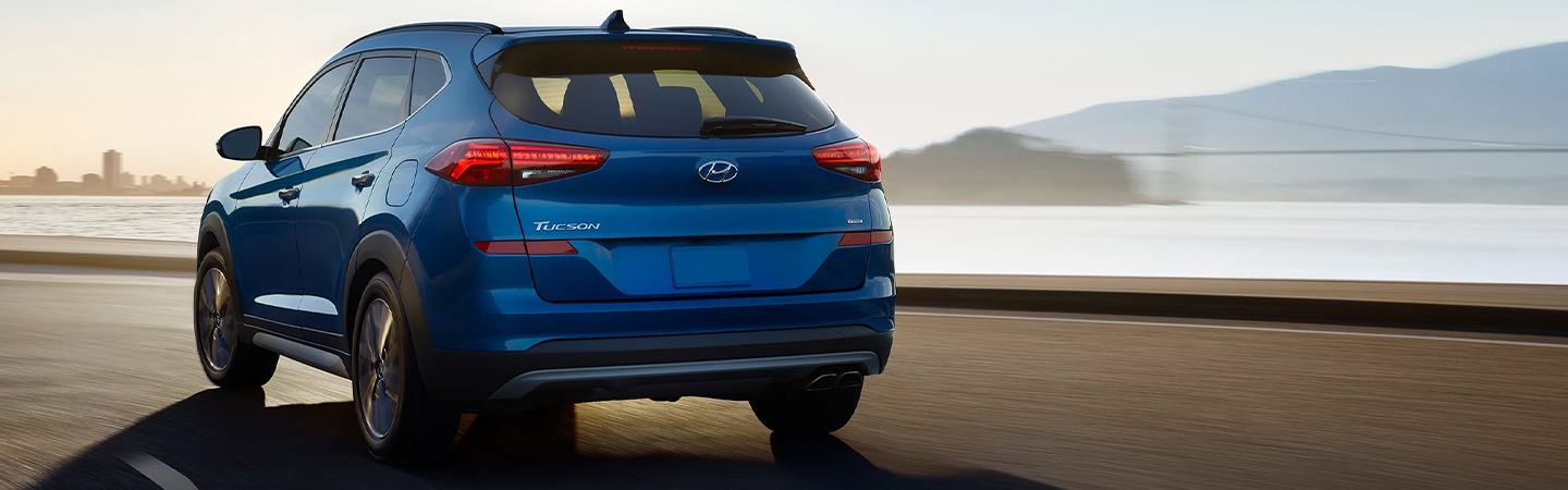 Rear of Hyundai Tucson in motion