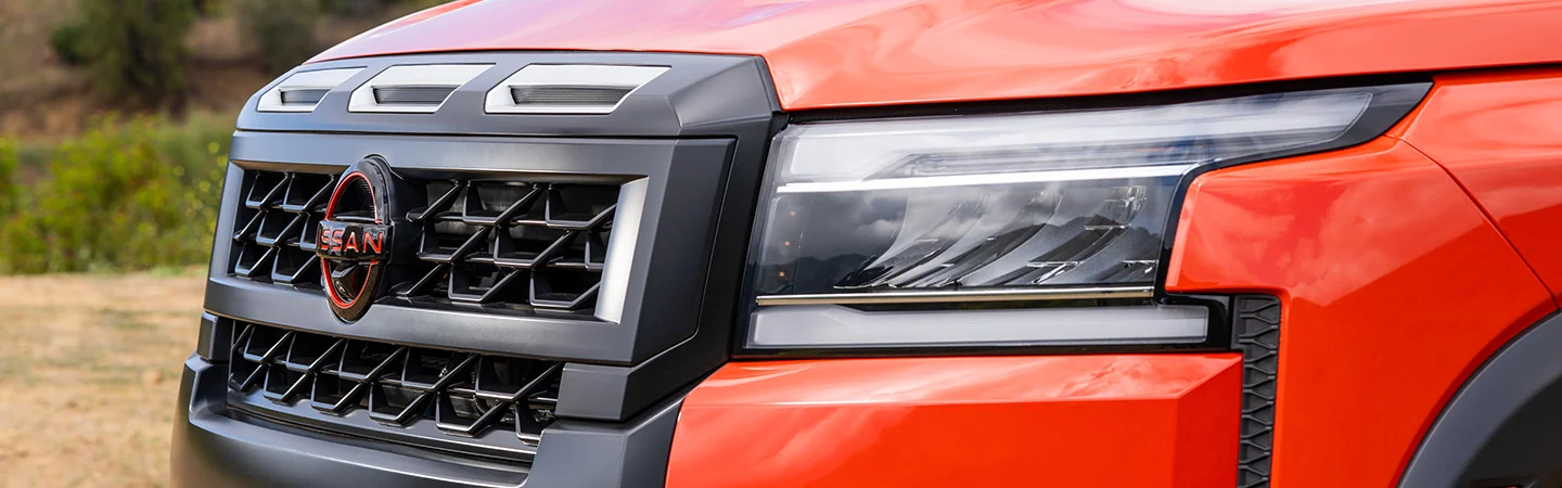 View of the front grill of the 2025 Nissan Frontier SL