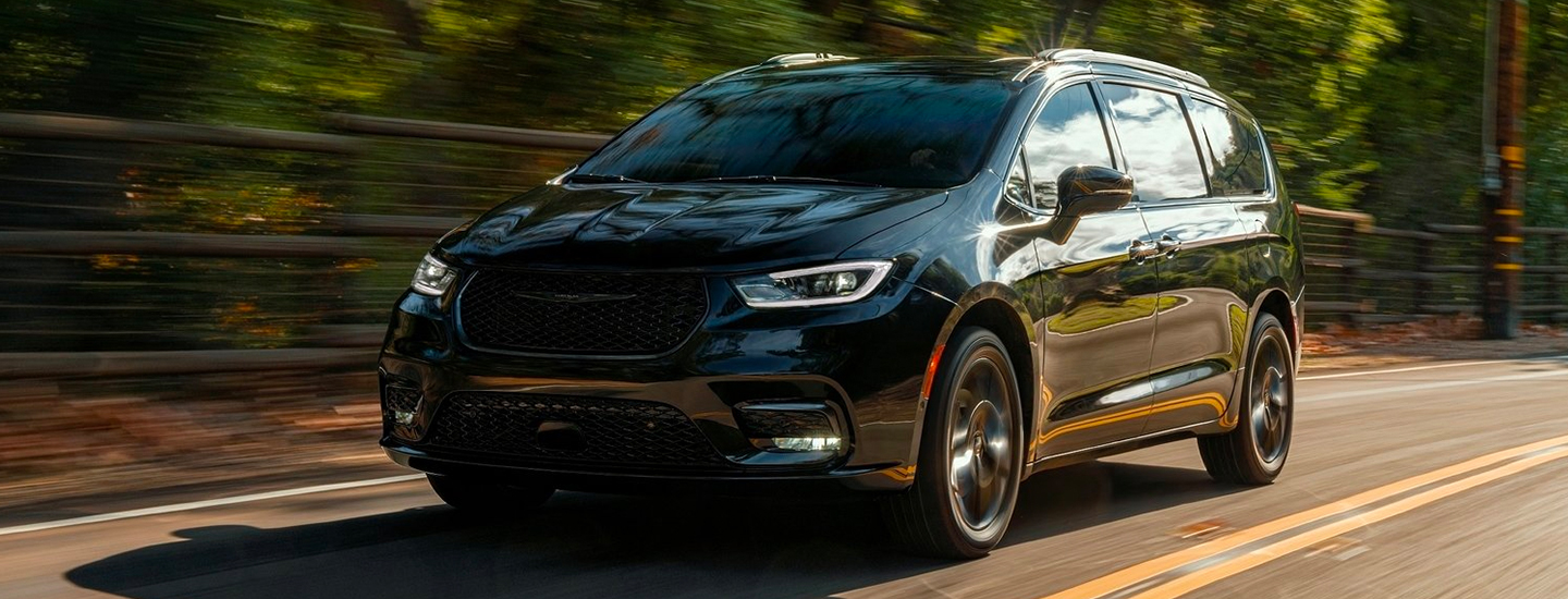 Black 2021 Chrysler Pacific in motion
