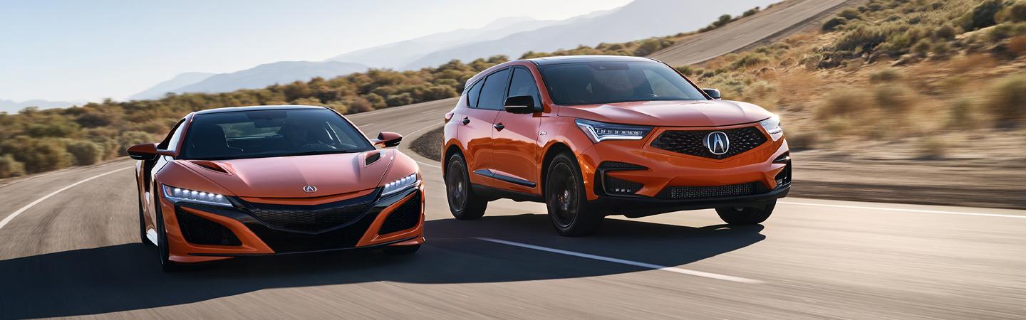  A 2022 Acura RDX and NSX driving next to each other