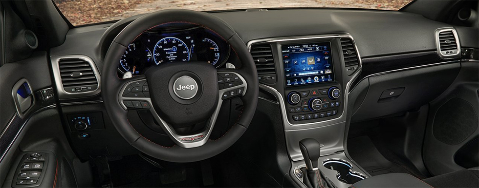 Safety features and interior of the 2019 Jeep Grand Cherokee - available at our Jeep dealership near Edmond.