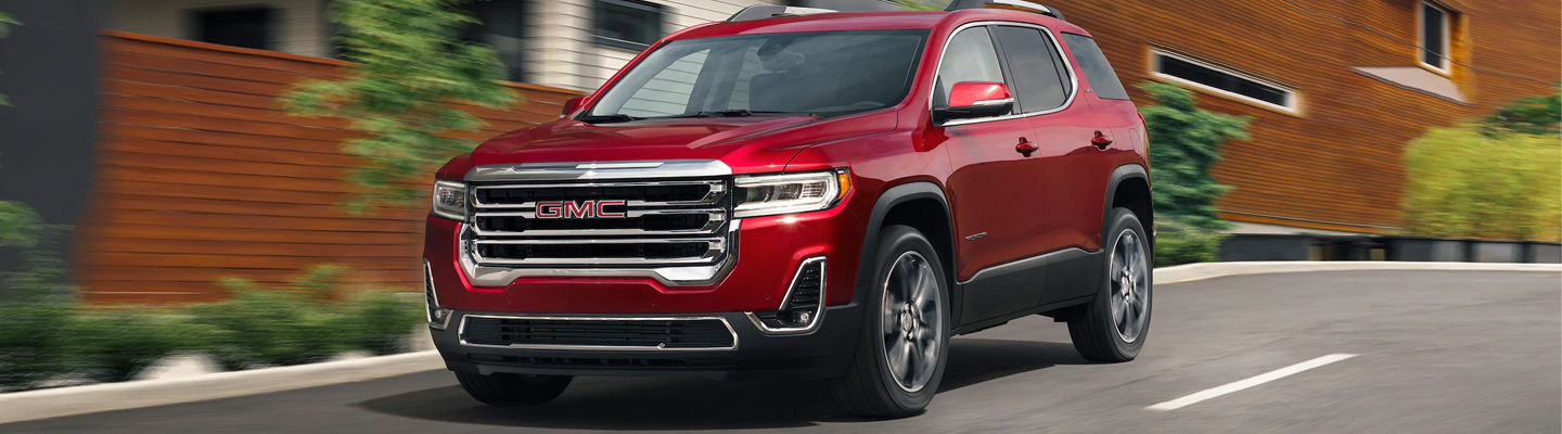 2020 GMC Acadia driving on a city street