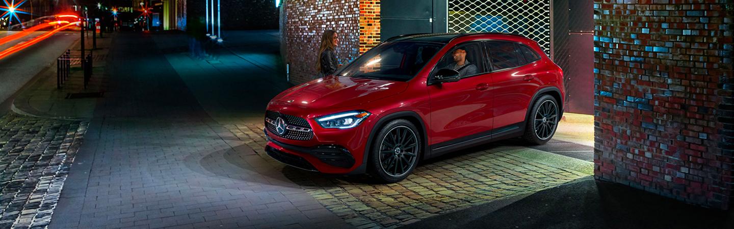 Red 2021 Mercedes-Benz GLA 250 parked in an alley