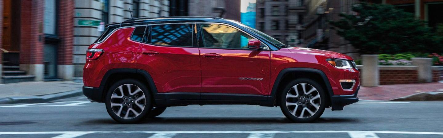 Red 2021 Jeep Compass in motion