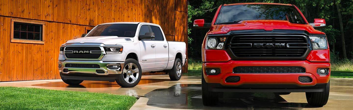 Two 2020 RAM 1500 models parked side by side