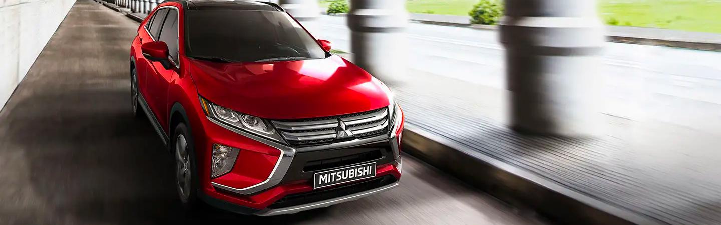 Red 2020 Mitsubishi Eclipse Cross in motion