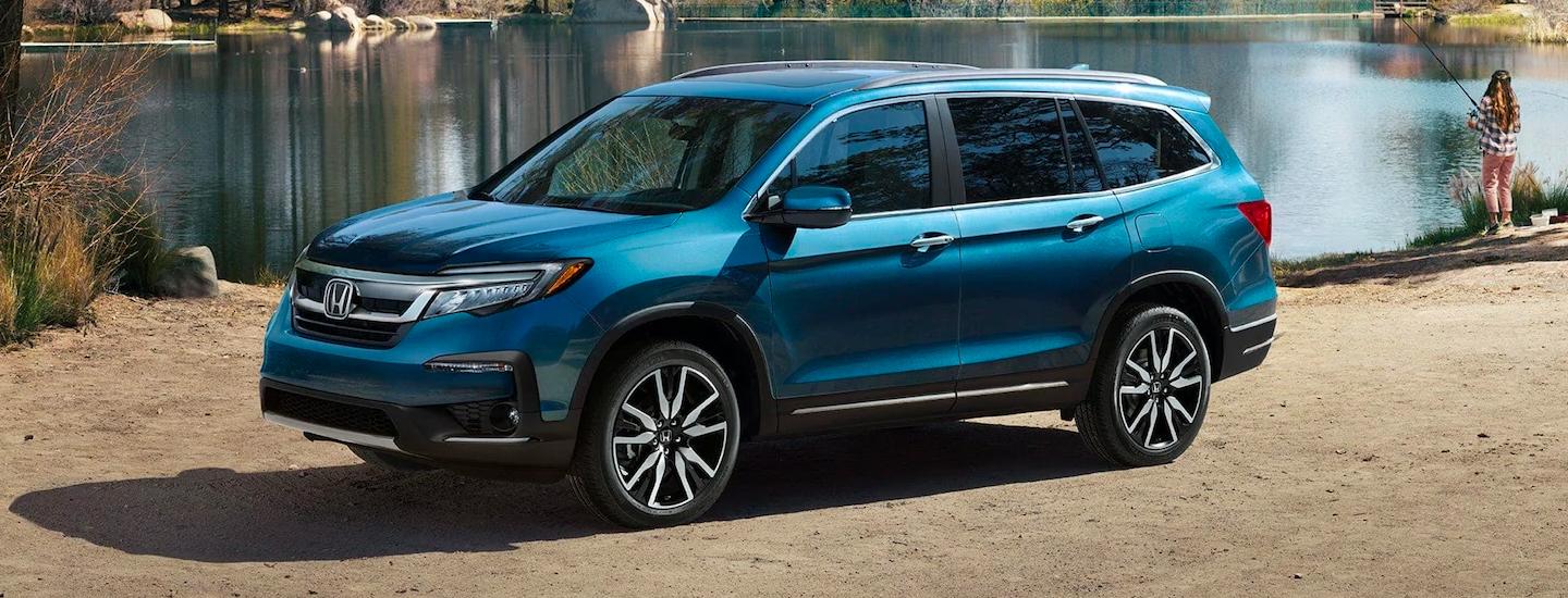2020 Honda Pilot parked by a lake