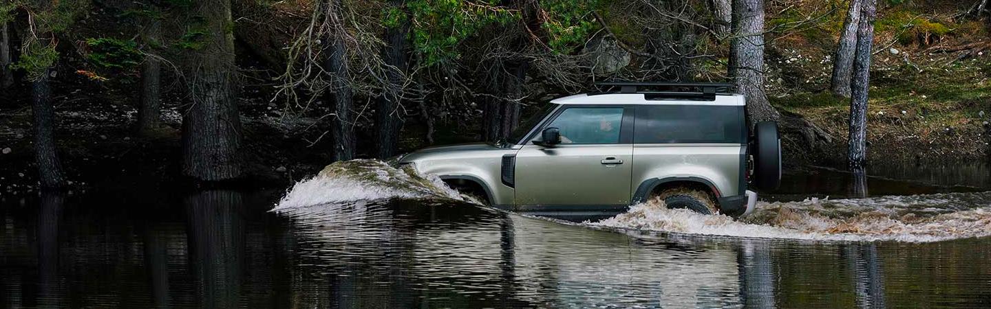 2021 Land Rover Defender driving in water