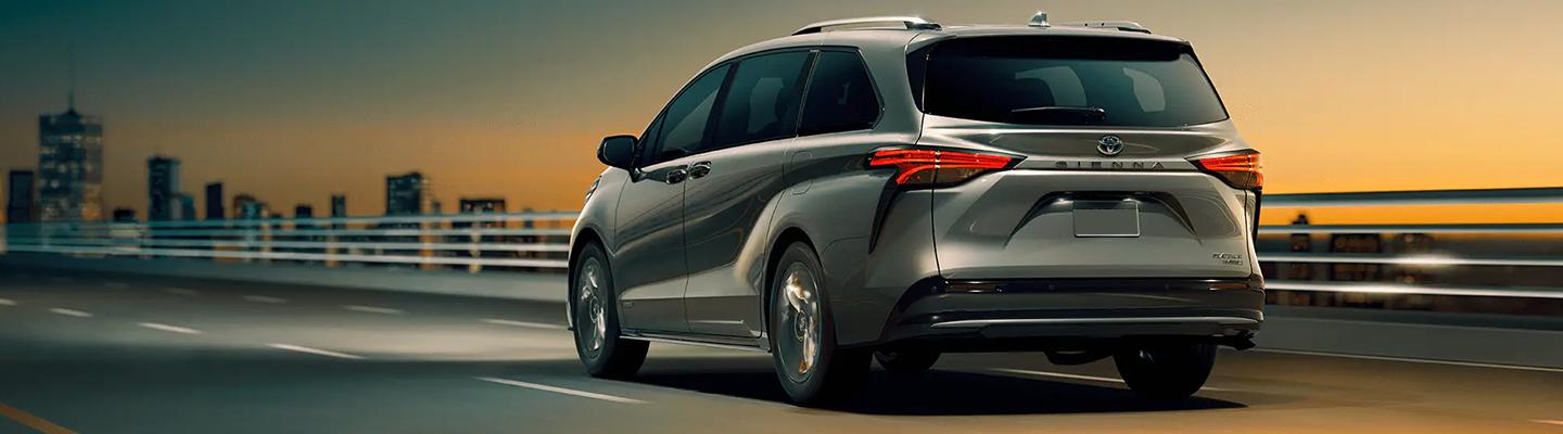 Rear view of the 2021 Toyota Sienna in motion