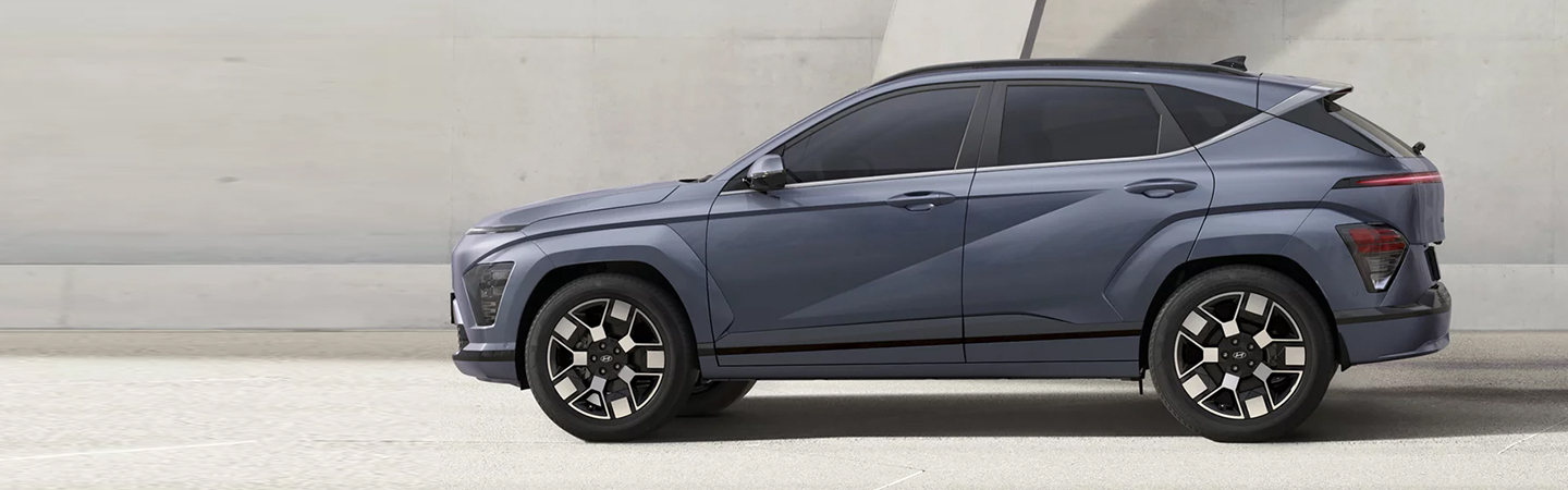 2024 Hyundai Kona Electric Range Side front view in silver colour