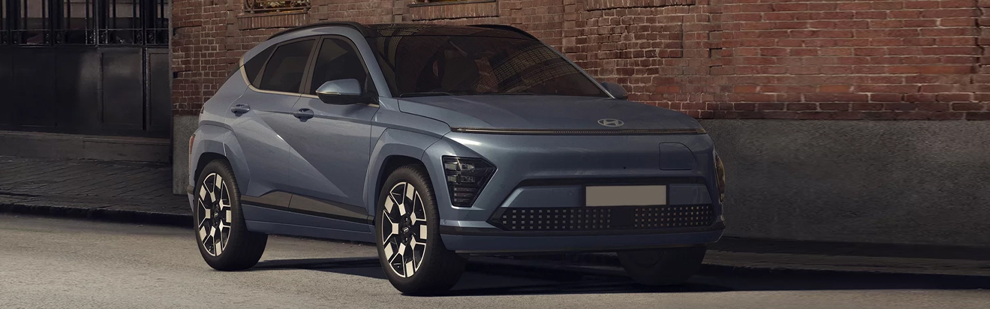 2024 Hyundai Kona Electric Range Side front view in silver colour