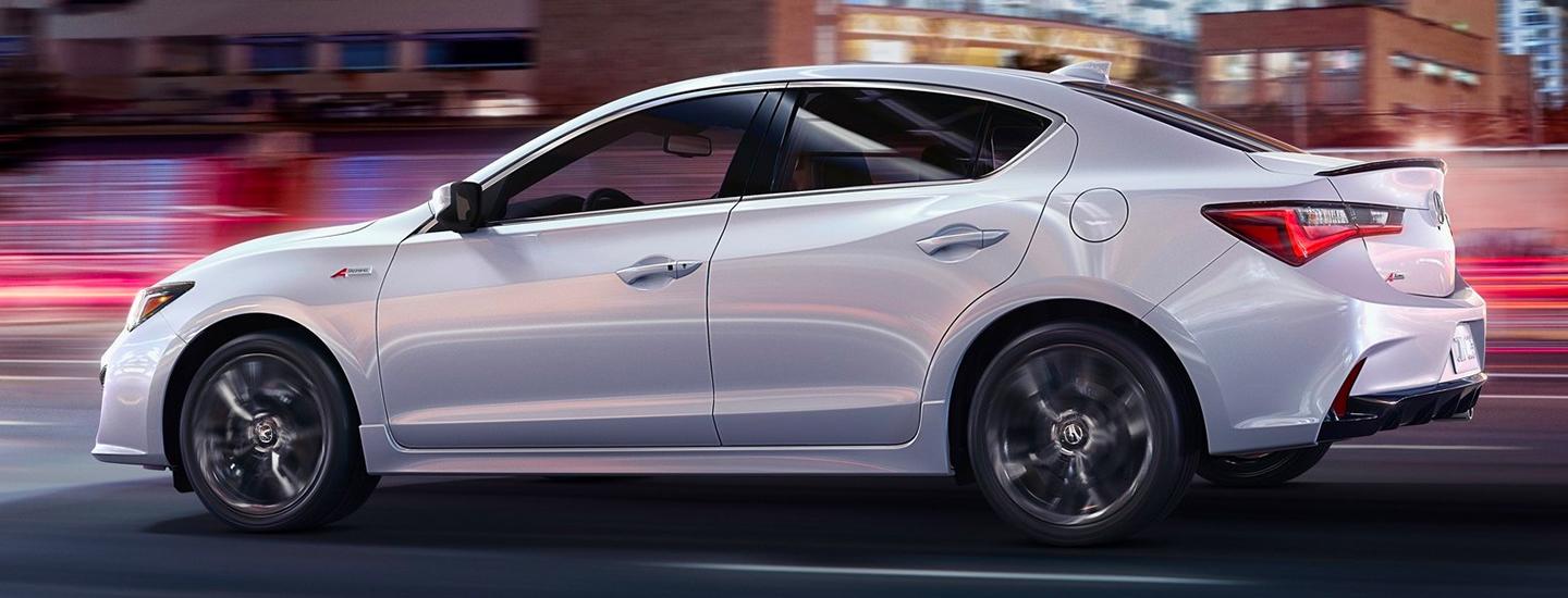 Side profile view of a 2020 ILX in motion