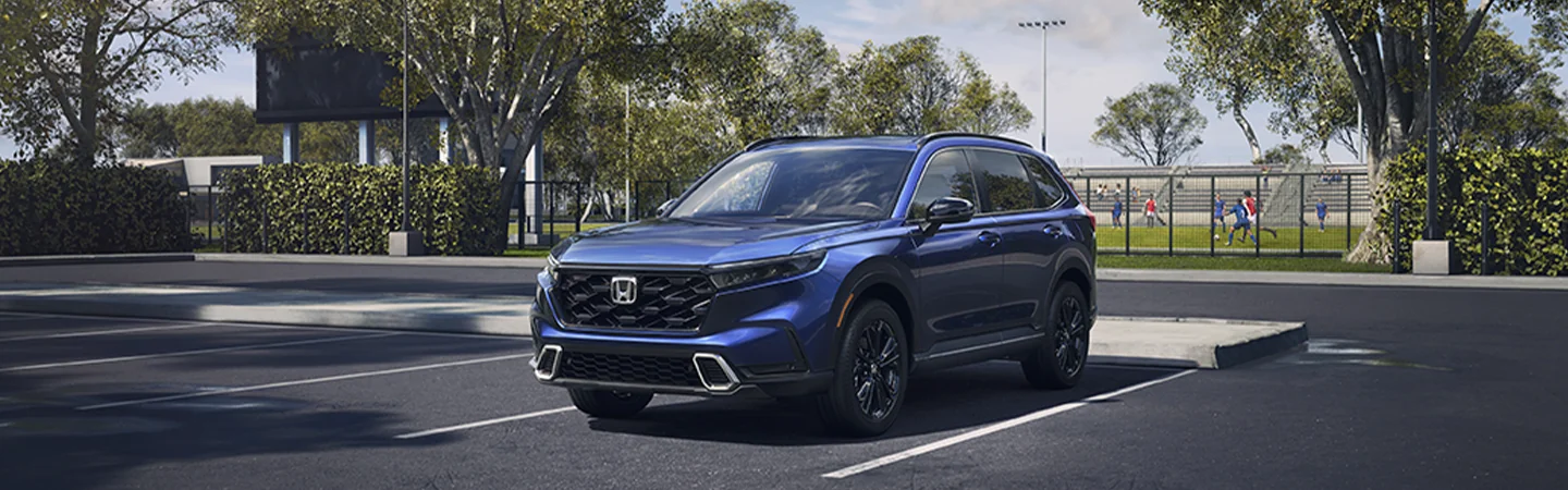2025 Honda CR-V parked in front of sports fields