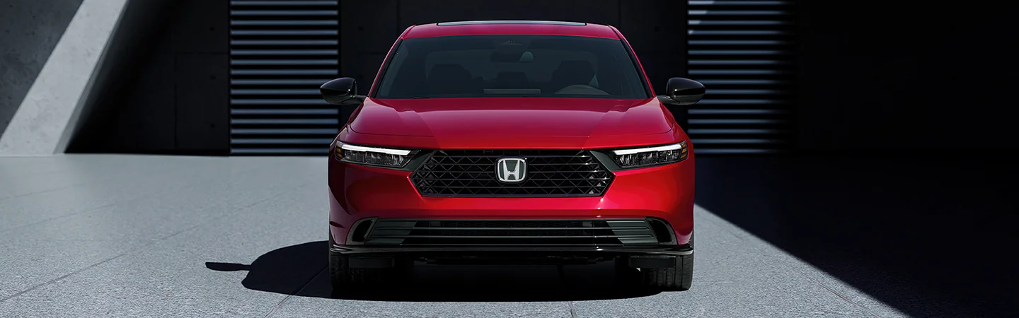 Front view of the 2025 Honda Accord parked in a parking garage