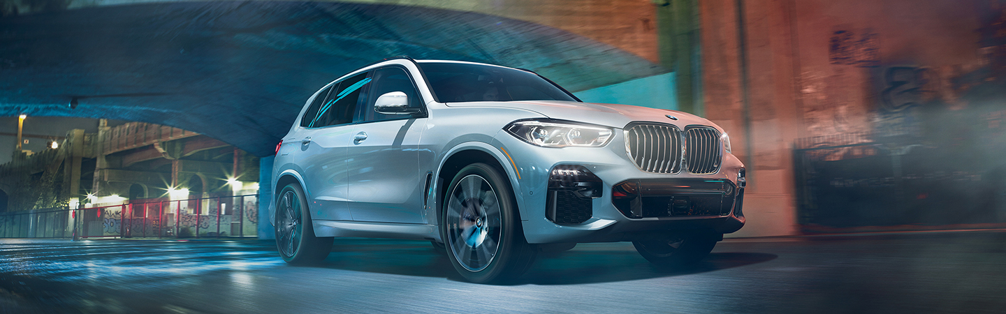 White 2021 BMW X5 Driving Through City Tunnel