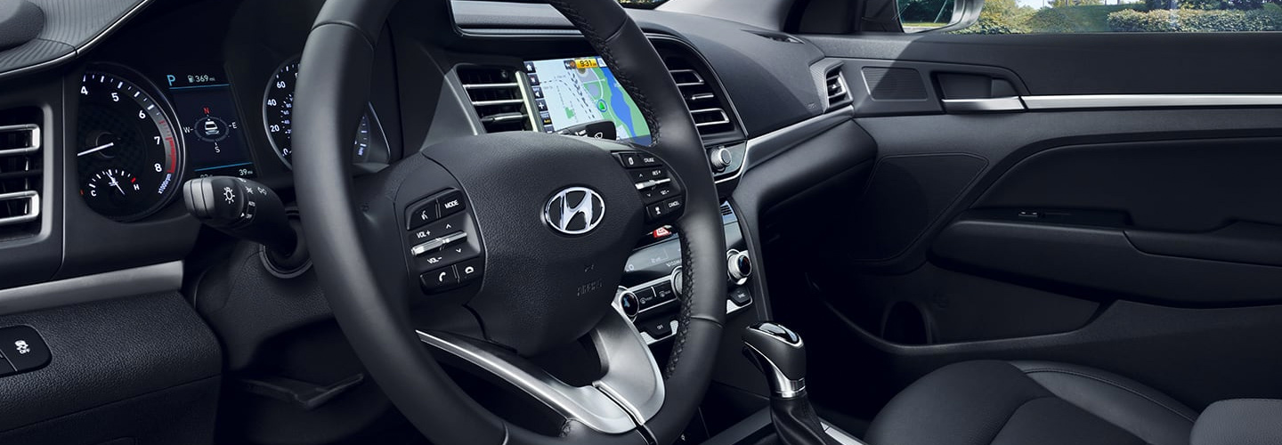 Steering wheel and interior dash view of the 2020 Hyundai Elantra
