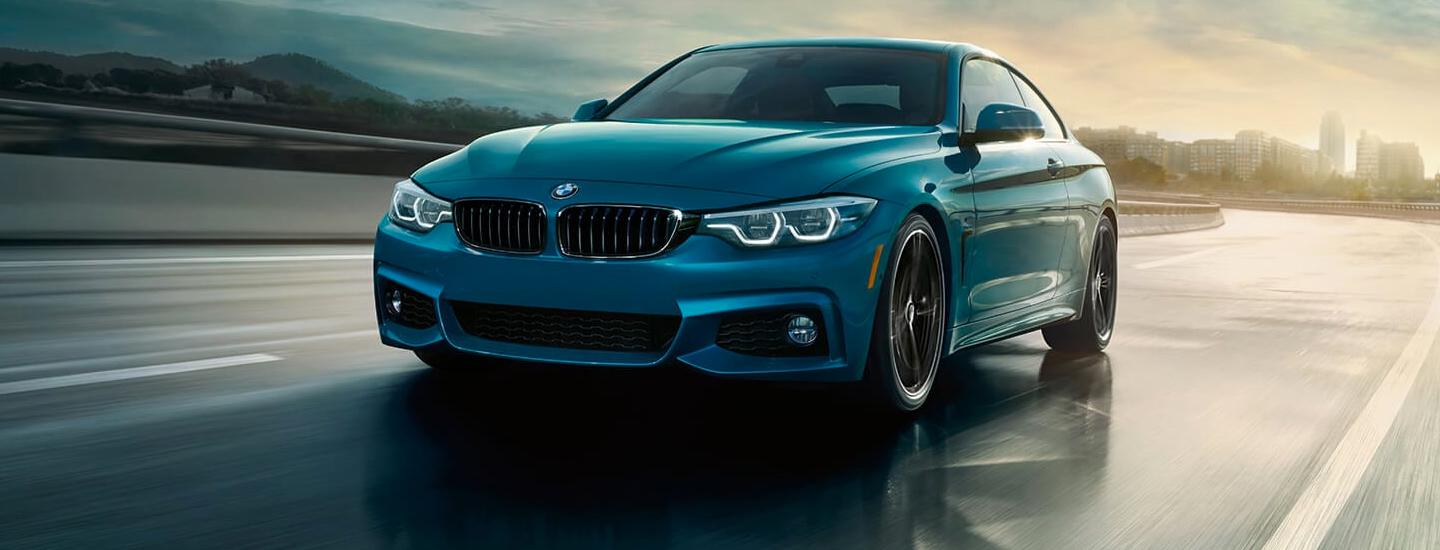 Front view of a 2020 BMW 4 Series in motion