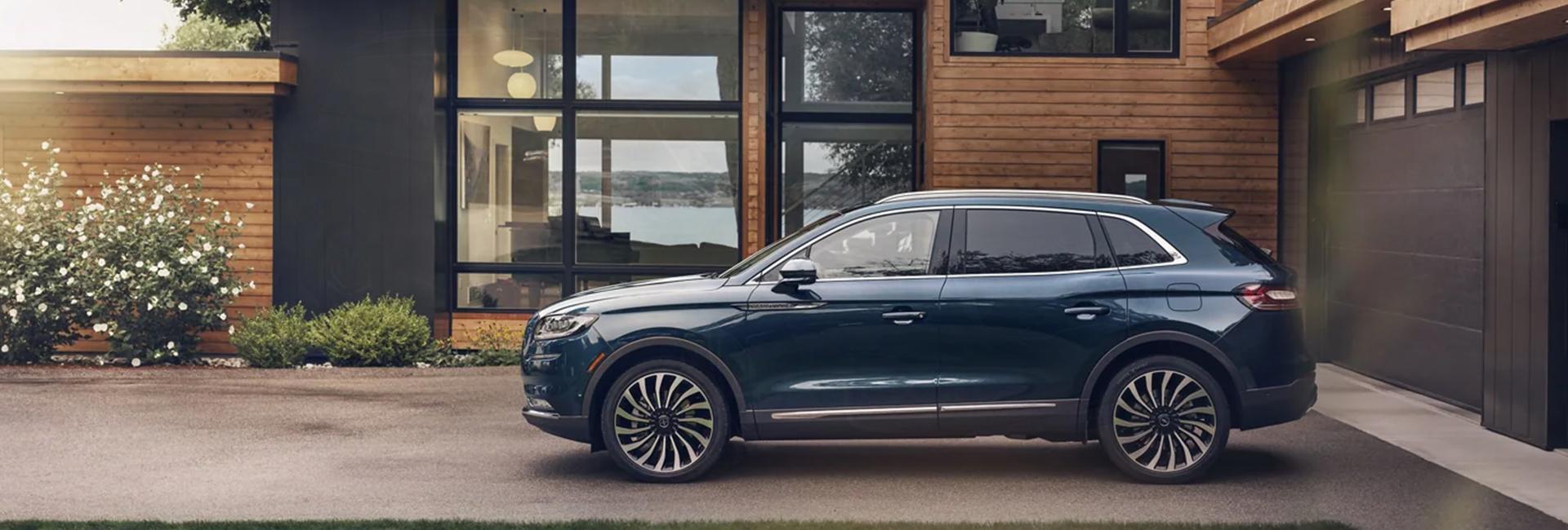 Side view of a green 2022 Lincoln Nautilus