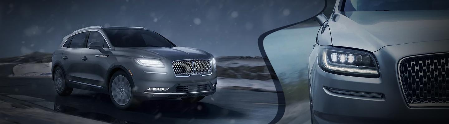 Lincoln Nautilus driving with headlights on - front view of right headlight