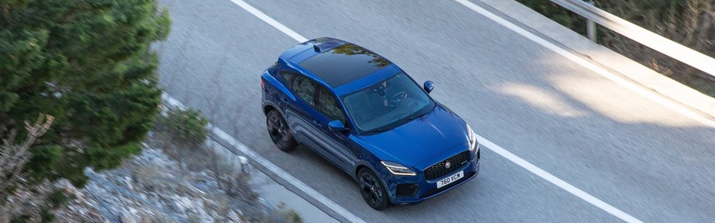 Aerial view of the 2021 Jaguar E-PACE driving on the highway