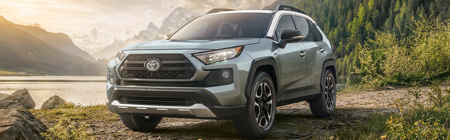 2020 Toyota RAV4 parked next to a lake