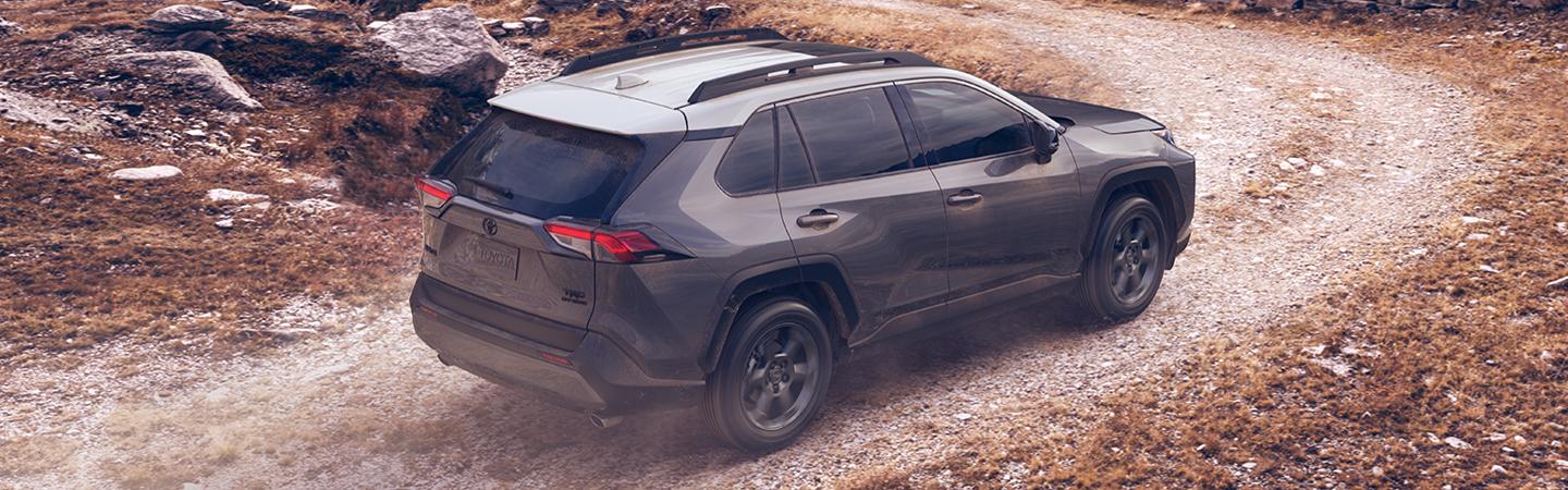 2020 Toyota RAV4 driving on a dirt road