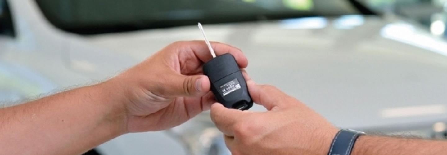 Keys to car being handed over