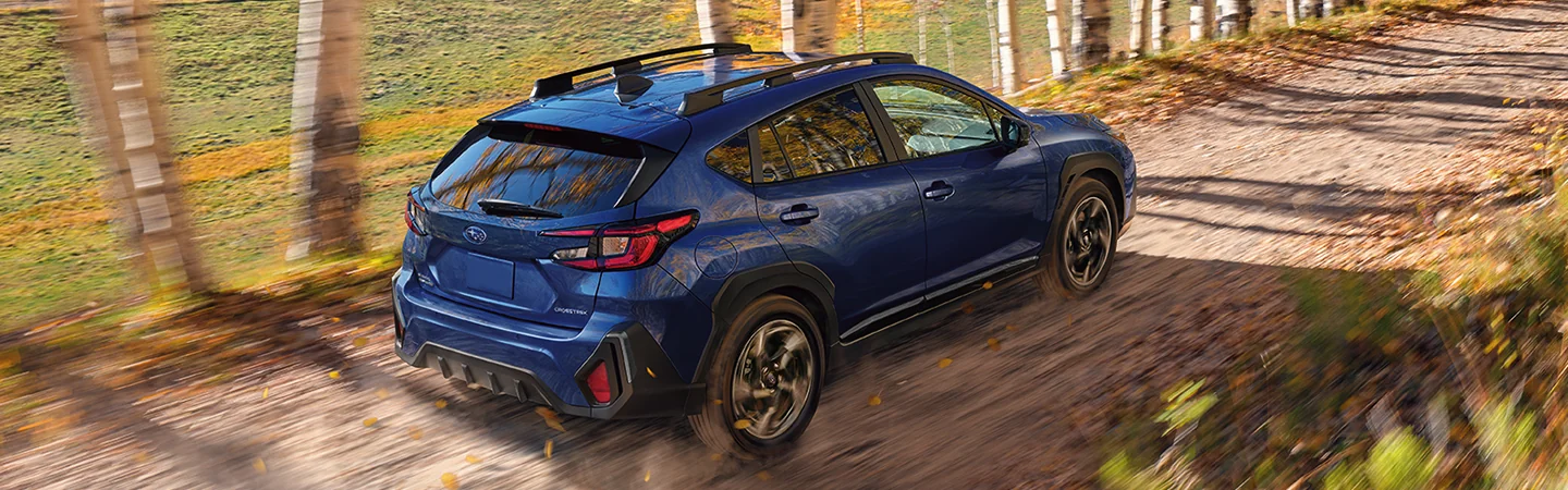 2025 Subaru Crosstrek driving down a dirt road Leesburg FL