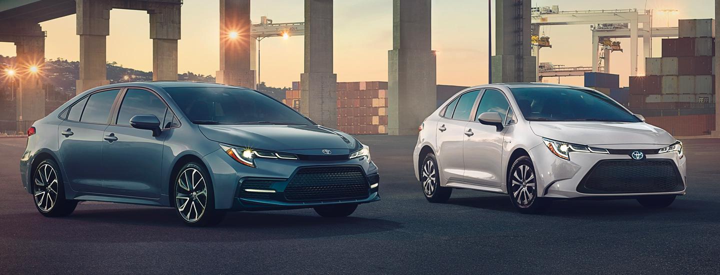 Blue 2021 Toyota Corolla and 2021 White Toyota Corolla Parked