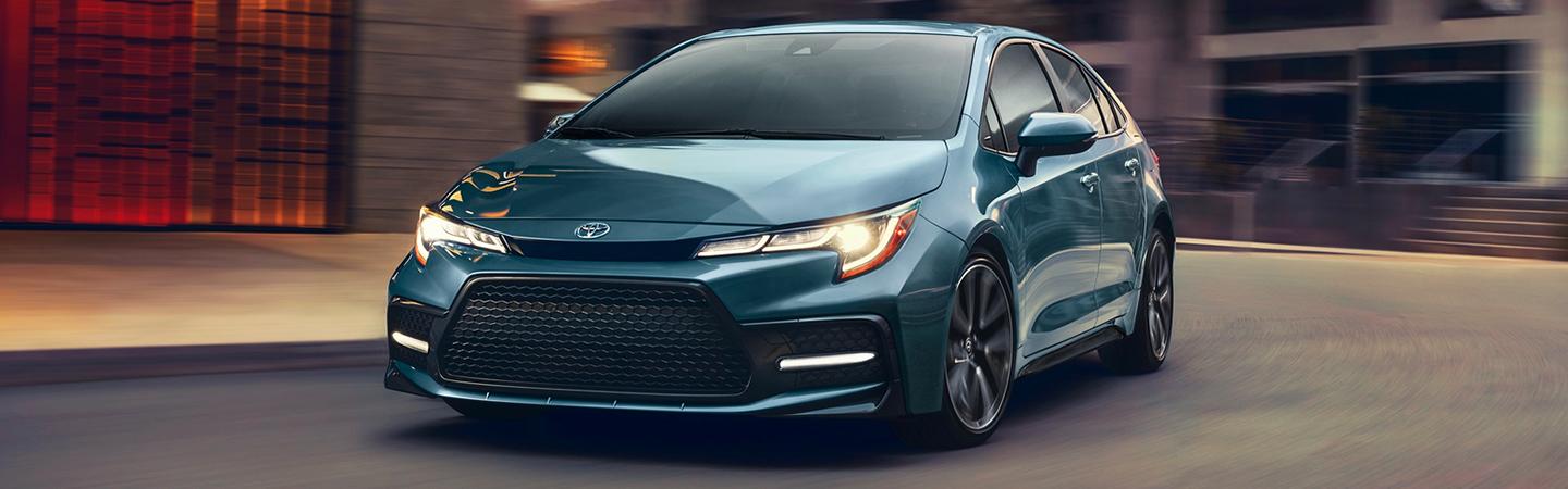 Turquoise 2021 Toyota Corolla Parked