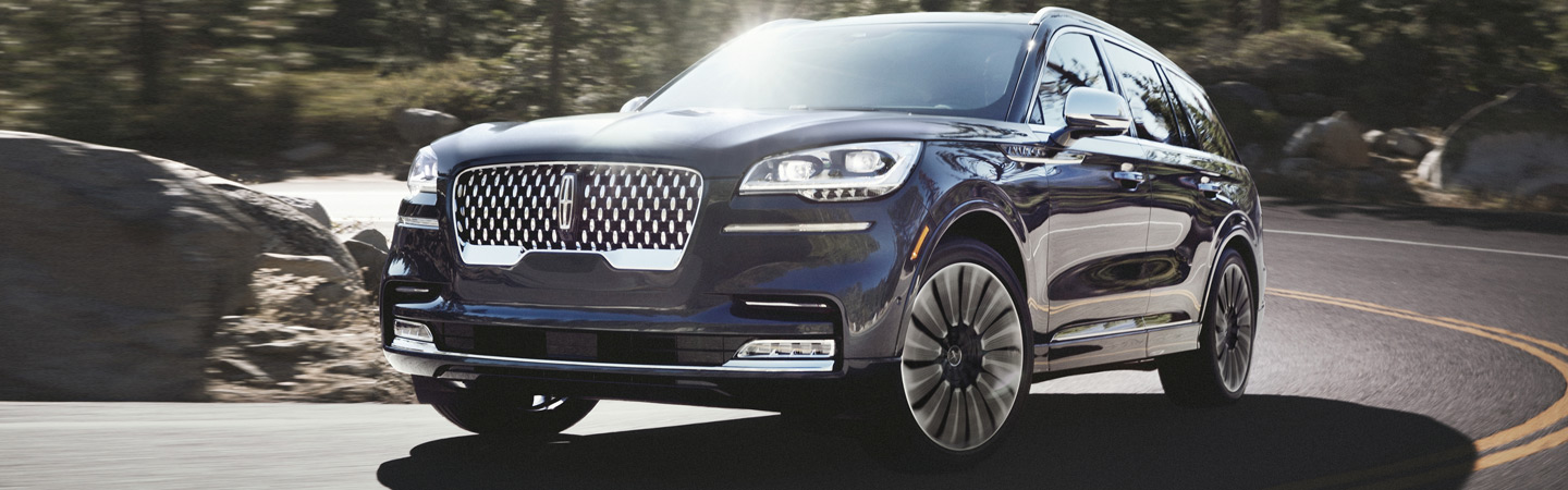 Front view of the 2020 Lincoln Aviator driving uphil