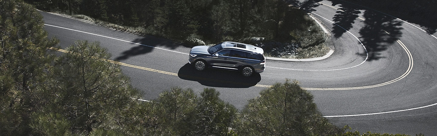Overview of the 2020 Lincoln Aviator in motion uphill