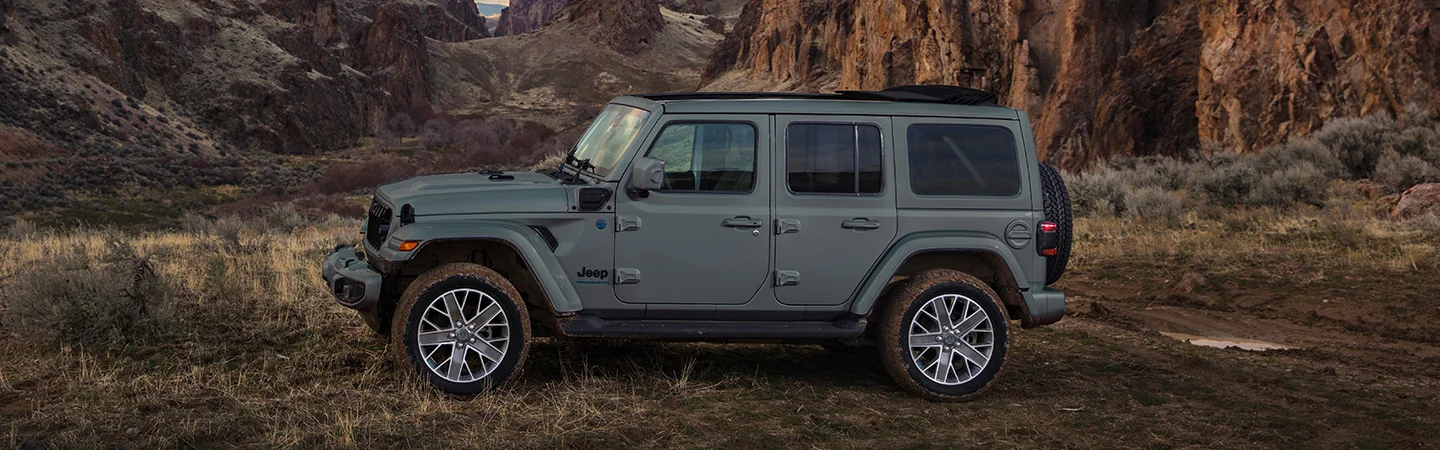 2025 Jeep Wrangler Rubicon parked in front of mountains