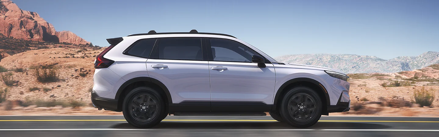 passenger side view of a white 2026 Honda CR-V Sport Touring