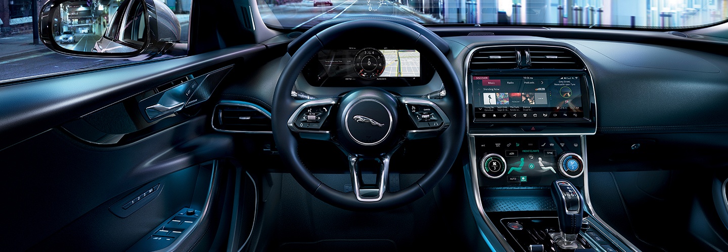 Interior view of the steering wheel and infotainment system