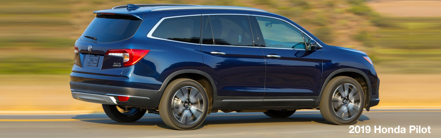 Blue 2019 Honda Pilot in motion