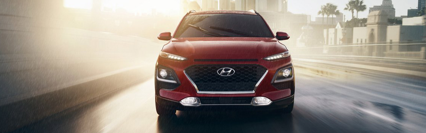 Red 2021 Hyundai Kona in motion