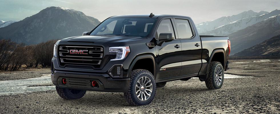 2019 GMC Sierra 1500 front view parked in mountains.