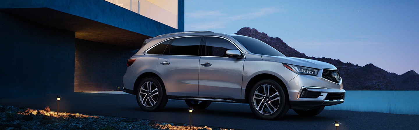 Front passenger profile view of the Acura MDX