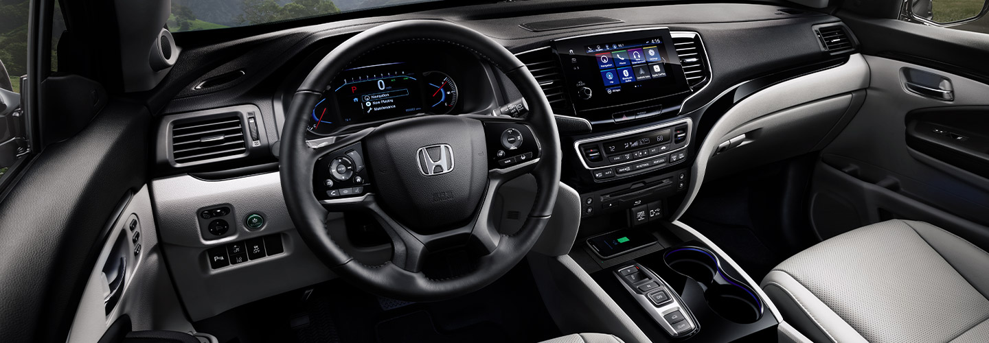 Steering wheel and tech in the Honda Pilot.