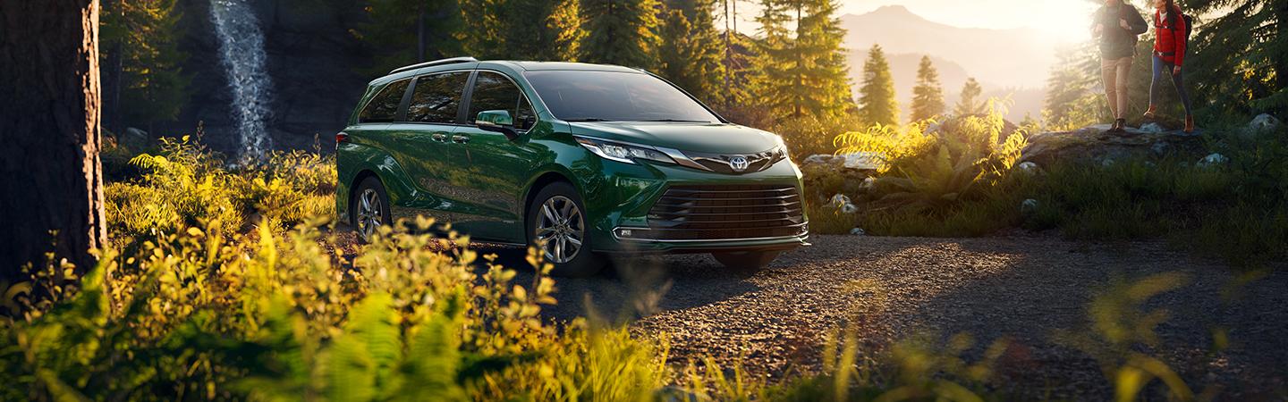 Green 2020 Toyota Sienna Parked in Forest