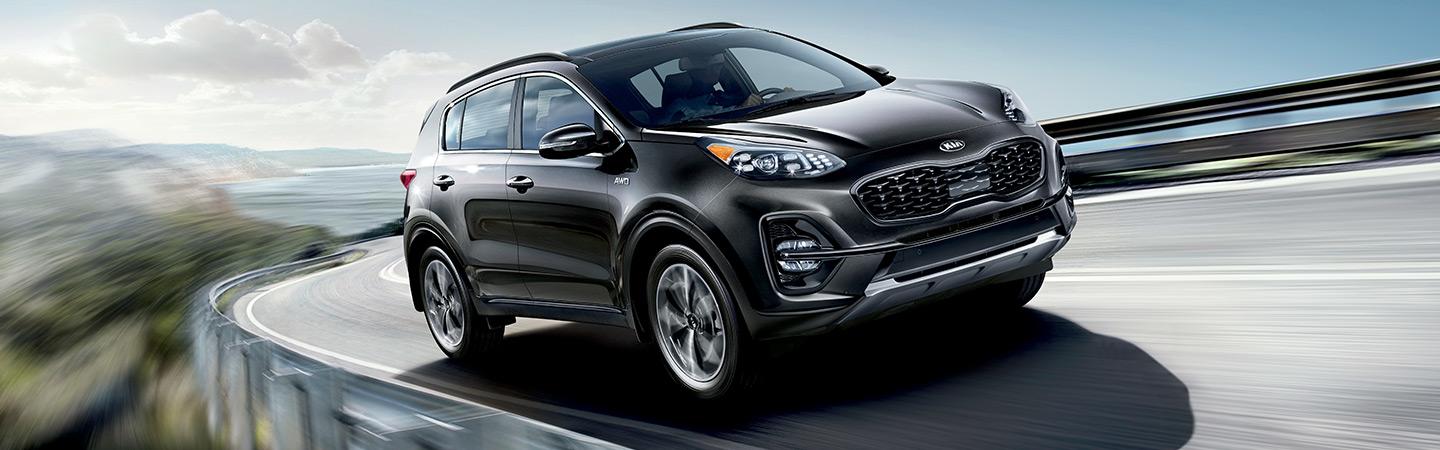 2021 Kia Sportage turning on a road