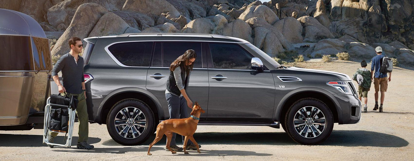 2019 Nissan Armada pulling camper parked