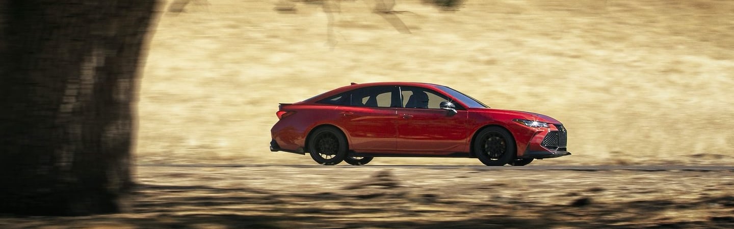 Red 2020 Toyota Avalon TRD in motion